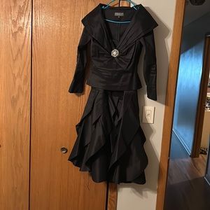 Size 10 but stretchy two piece dress. The skirt is mermaid with layers
